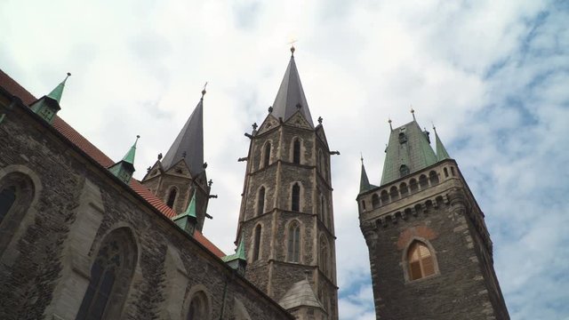 Church of St. Bartolomeus in Kol&iacute;n a Gothic architecture  with Gargoyle statues a building. Kolin Czech Republic. Cloud time lapse