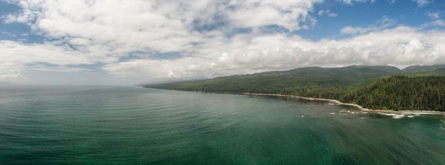 Beautiful Aerial Panoramic Landscape View of the Rocky Pacific Ocean Coast in the Southern Vancouver Island during a sunny summer day. Taken between Victorial and Port Renfrew, BC, Canada.