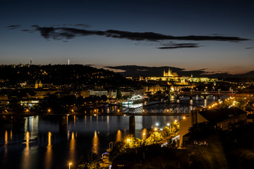 Fototapeta na wymiar View of Prague Castle over Vltava river from Vysehrad Castle in the evening. Prague, Czech Republic