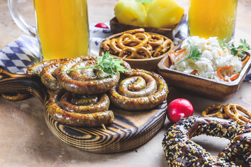 Meal for the Munich Oktoberfest with sausages and beer