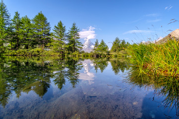 Reflection of Matterhorn in lake. Zermatt, Valais, Switzerland