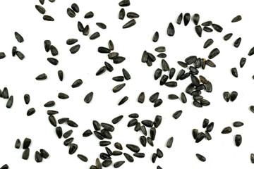 Fototapeta na wymiar Sunflower seeds, background or texture isolated on white. lose-up.