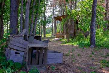 a bunch boxes on a local farm in the shade of Canada forests