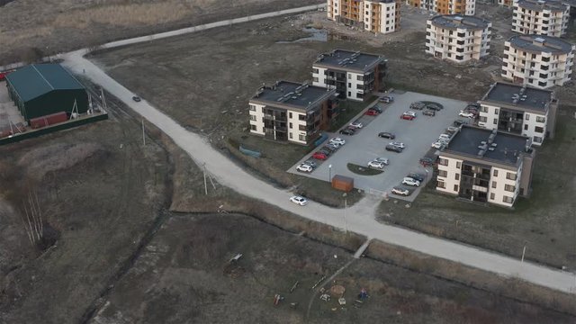 tracking from the air for a car moving in the residential area.