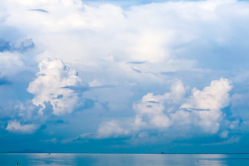 white cloud in summer clear blue sky background over sea