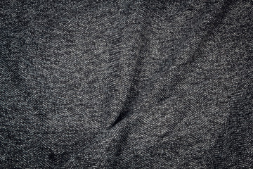 Fabric coat gray tweed. Color texture of the coat fabric close-up.