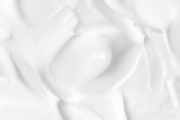 Lotion texture. White skin care cream background. Cosmetic creamy smudge