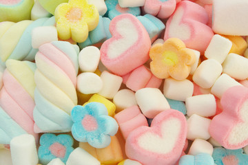 Colorful marshmallow candies background or texture