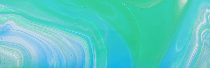 photography of abstract marbleized effect background. Blue, mint and white creative colors. Beautiful paint. banner