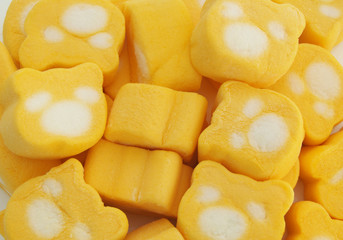 Bear shaped yellow marshmallows close up