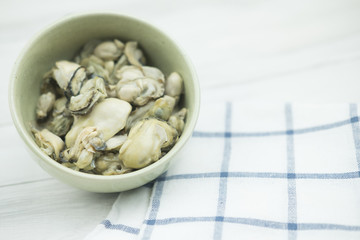 Raw oyster in bowl prepare for cooking.