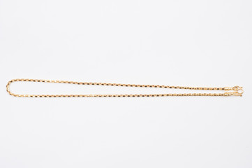 Naklejka premium Gold chain necklace isolated on white background.