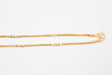 Fototapeta na wymiar Gold chain necklace isolated on white background.