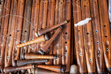 Bobbins on a loom ready to use