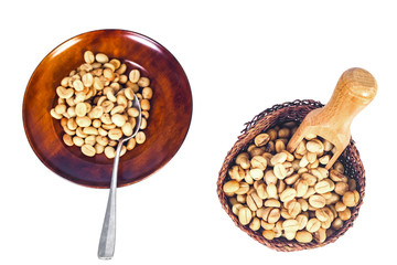 Fresh Raw coffee beans in wood dish on white background.