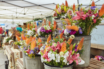 Bouquets of fresh cut flowers on display at a farmers market in Boulder, Colorado