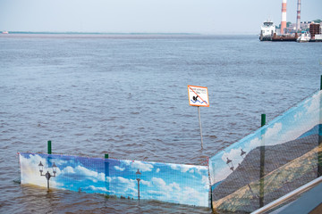 Khabarovsk, Russia - Aug 08, 2019: Flood on the Amur river near the city of Khabarovsk. The level of the Amur river at around 159 centimeters.