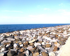 Fototapeta na wymiar rocky shore and sea surface
