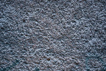 Cement plastered stone wall. Texture, design, background.