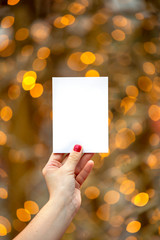 woman hand holding white card