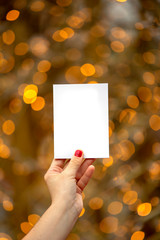 woman hand holding white card