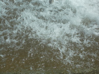 The surface of the water in the fountain