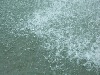The surface of the water in the fountain