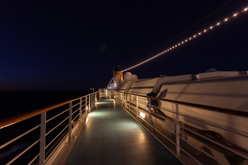 Top paddle of cruise ship at night