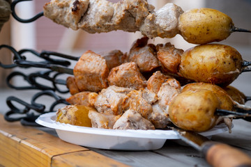 Skewers in the tandoor. Cooking kebab of meat in a tandoor.