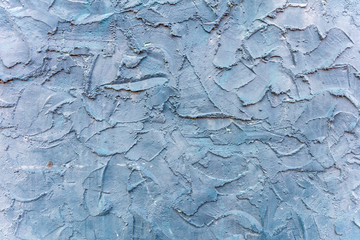 Plastered wall blue color, rough surface full background, texture