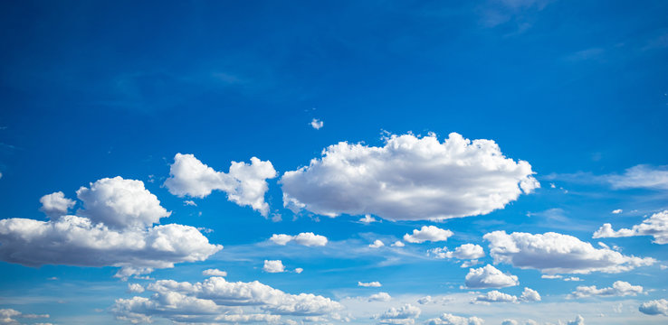 Blue sky background with clouds, sunny spring day © Rawf8