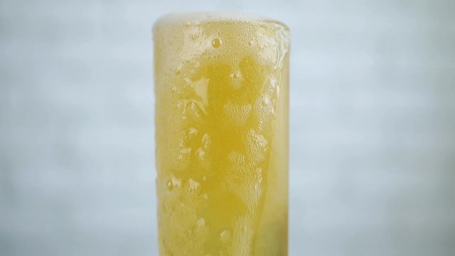 Glass Full Filled with Cold and Fresh Beer a Refreshment Alcoholic Beverage 