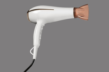 Fototapeta premium Hair dryer isolated on grey