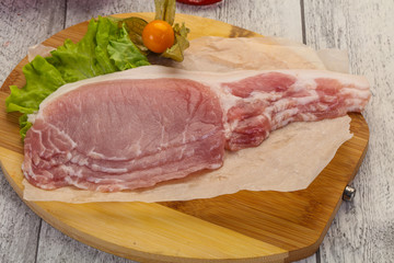 Raw pork bacon