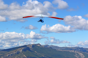 Fototapeta na wymiar Hang Glider flying on the Chabre mountain, France