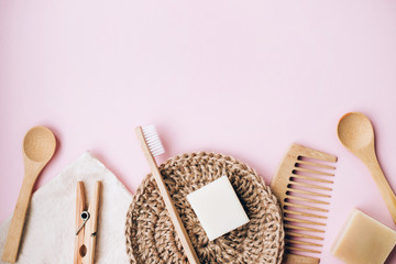 Zero waste set for bathing on light pink background.