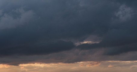 summer sunset skyscape with moving clouds
