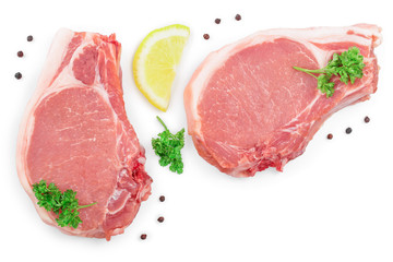 sliced raw pork meat with parsley and lemon isolated on white background with copy space for your text. Top view. Flat lay