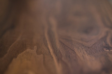 Closeup of real black walnut wood texture with natural grain