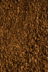 a background of fresh ground coffee granules