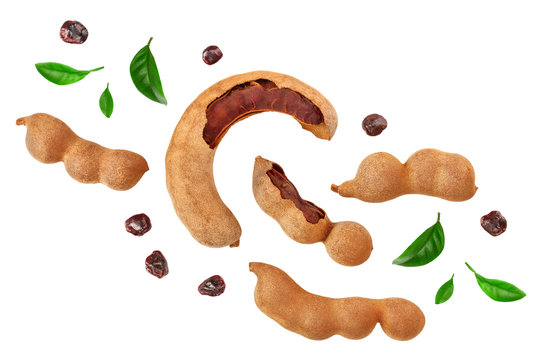 Tamarind fruit with leaf and seed isolated on white background, Top view. Flat lay