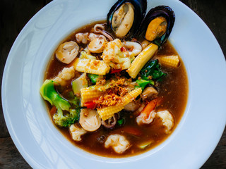 Fried noodle with pork and kale soaked in gravy