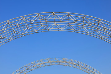 Steel arch in blue sky