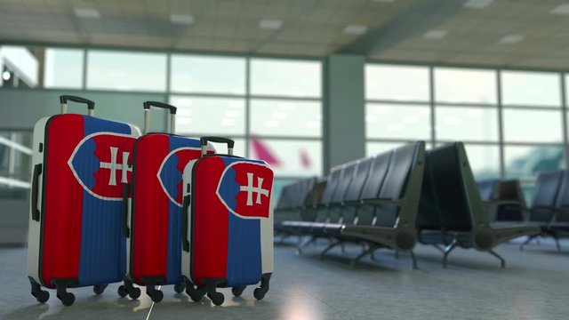Travel suitcases with flag of Slovakia. Slovak tourism conceptual 3D animation
