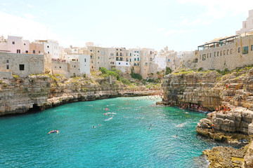 Polignano a mare breathtaking sight, Apulia, Italy. Italian panorama. Cliffs on adriatic sea.