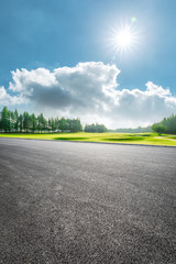 Country road and green woods nature landscape in summer © ABCDstock