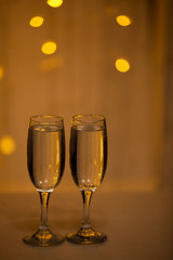 Glasses on a background of illumination
