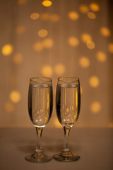 Glasses on a background of illumination