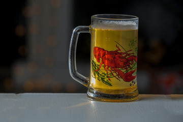 Glass against the background of illumination