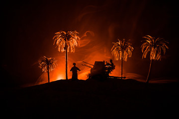 War Concept. Military silhouettes fighting scene on war fog sky background,